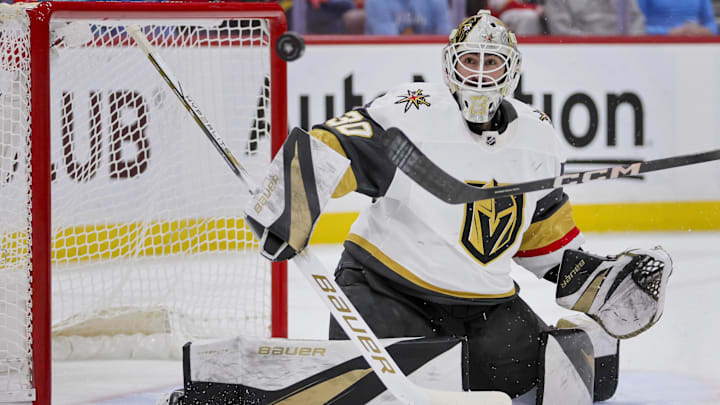 Dec 23, 2023; Sunrise, Florida, USA; Vegas Golden Knights goaltender Jiri Patera (30) watches the puck go wide against the Florida Panthers during the second period at Amerant Bank Arena. Mandatory Credit: Sam Navarro-Imagn Images