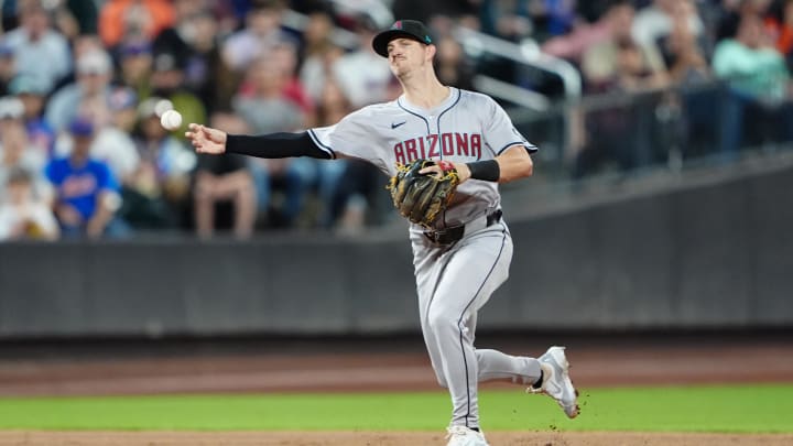 May 31, 2024; New York City, New York, USA; Arizona Diamondbacks shortstop Kevin Newman (18) throws out New York Mets shortstop Francisco Lindor (not pictured) during the seventh inning at Citi Field. Mandatory Credit: Gregory Fisher-USA TODAY Sports