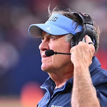 Oct 31, 2025; Syracuse, New York, USA; North Carolina Tar Heels head coach Bill Belichick looks to the clock in the fourth quarter game against the Syracuse Orange at the JMA Wireless Dome. Mandatory Credit: Mark Konezny-Imagn Images