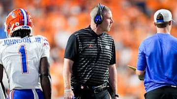 Florida head coach Billy Napier, center, during a SEC conference game between Tennessee and Florida in Neyland Stadium on Saturday, Oct. 12, 2024.