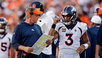 Sep 17, 2023; Denver, Colorado, USA; Denver Broncos head coach Sean Payton talks with quarterback