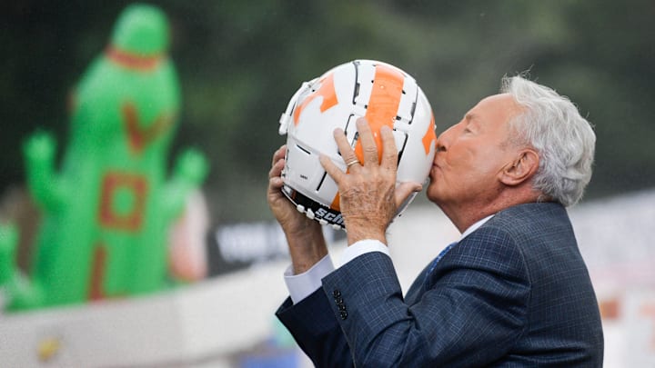 Lee Corso kisses a Tennessee Volunteers football helmet on the set of the ESPN College GameDay stage outside of Ayres Hall on the University of Tennessee campus in Knoxville, Tenn. on Saturday, Sept. 24, 2022. The flagship ESPN college football pregame show returned for the tenth time to Knoxville as the No. 12 Vols hosted the No. 22 Gators.

Kns Espn College Gameday