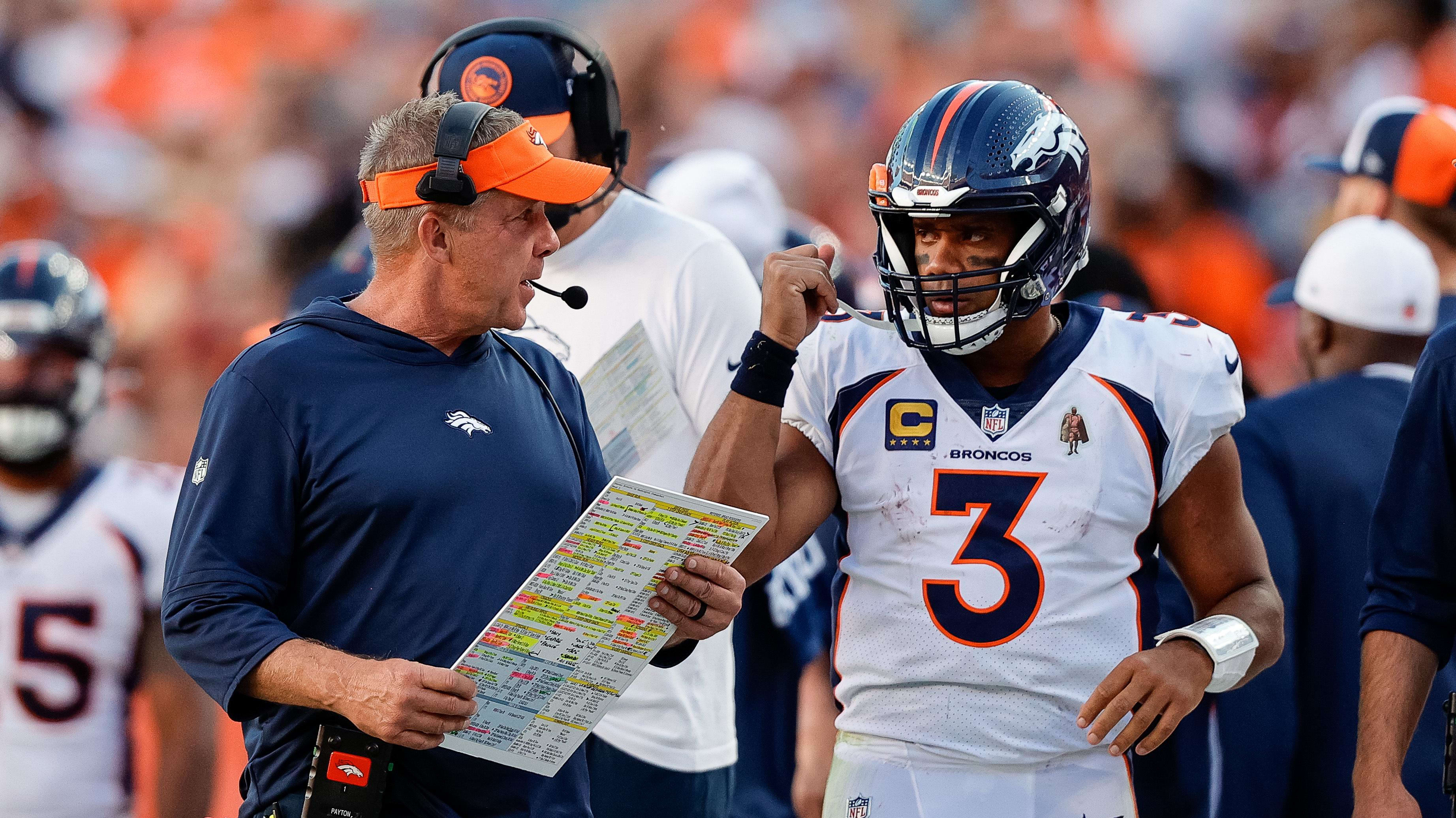 Denver Broncos head coach Sean Payton and quarterback Russell Wilson