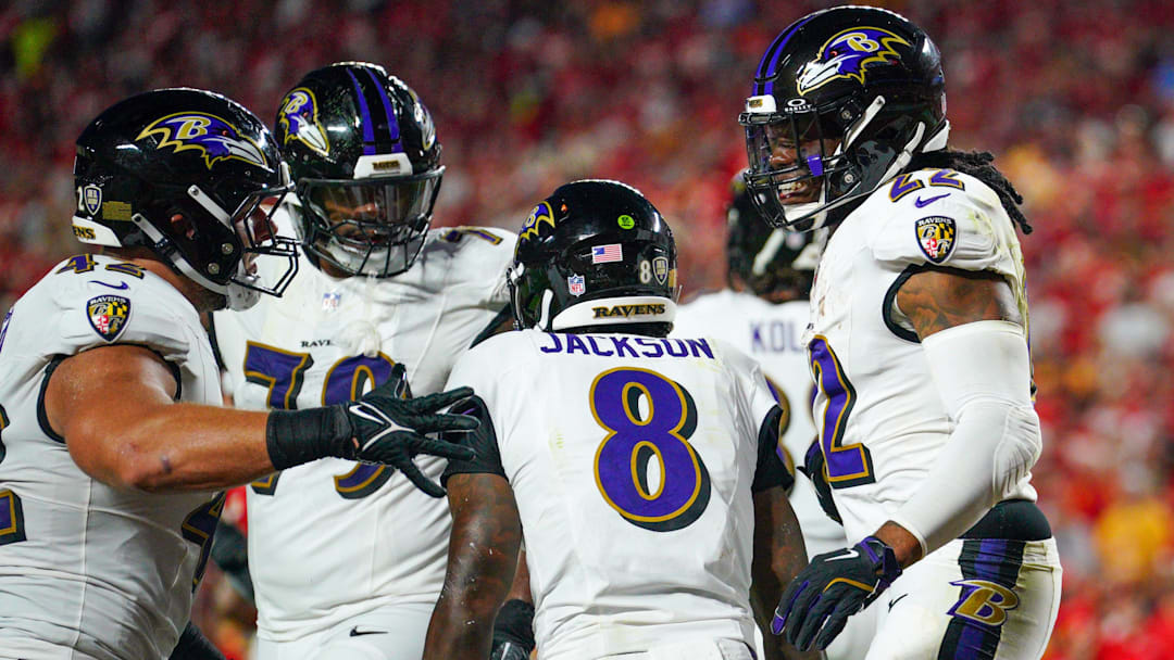 Sep 5, 2024; Kansas City, Missouri, USA; Baltimore Ravens running back Derrick Henry (22) celebrates with quarterback Lamar Jackson (8) after scoring against the Kansas City Chiefs during the first half at GEHA Field at Arrowhead Stadium.