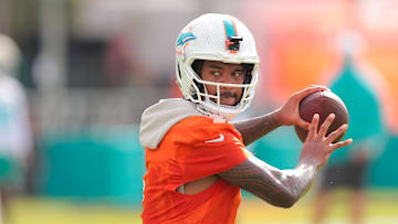 Jul 28, 2025; Miami Gardens, MI, USA; Miami Dolphins quarterback Tua Tagovailoa (1) throws the football during training camp at Baptist Health Training Complex. Mandatory Credit: Sam Navarro-Imagn Images