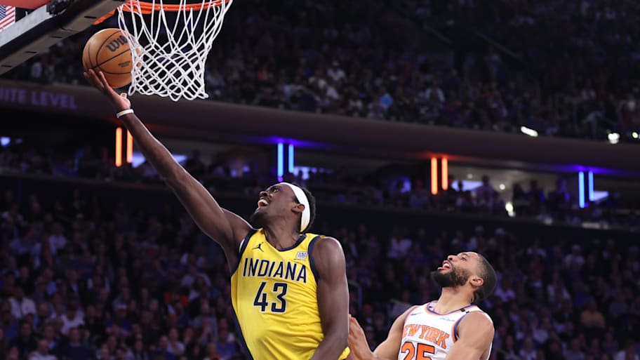 Pacers forward Siakam shoots while under pressure from Knicks forward Bridges during Game 2 of the Eastern Conference Finals. | Wendell Cruz-Imagn Images