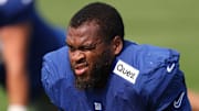 Aug 4, 2025; East Rutherford, NJ, USA; New York Giants offensive tackle Evan Neal (73) on the field during training camp at Quest Diagnostics Training Center. 