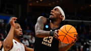 Mar 24, 2024; Memphis, TN, USA; Texas A&M Aggies guard Tyrece Radford (23) controls the ball against Houston Cougars guard L.J. Cryer (4) in the first half in the second round of the 2024 NCAA Tournament at FedExForum. Mandatory Credit: John David Mercer-Imagn Images