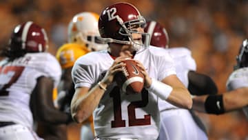 Oct 23, 2010; Knoxville, TN, USA; Alabama Crimson Tide quarterback Greg McElroy (12) sets up to pass against the Tennessee Volunteers during the first half at Neyland Stadium. Mandatory credit: Don McPeak-Imagn Images