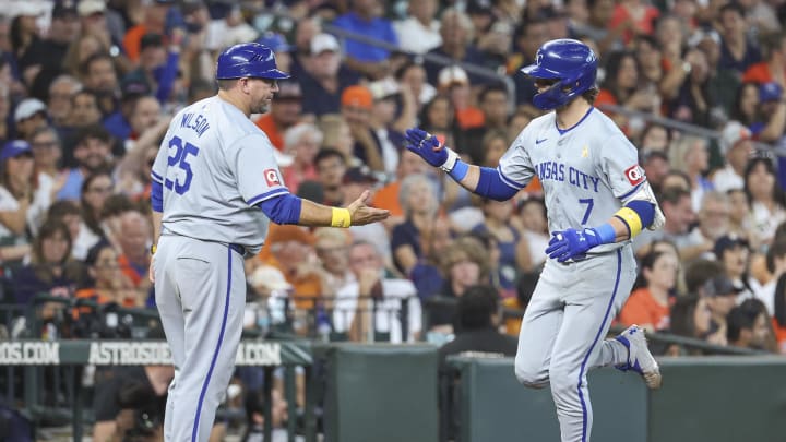 Kansas City Royals shortstop Bobby Witt Jr. (7) celebrates with third base coach Vance Wilson (25) after hitting a home run during the seventh inning against the Houston Astros at Minute Maid Park on Sept. 1.