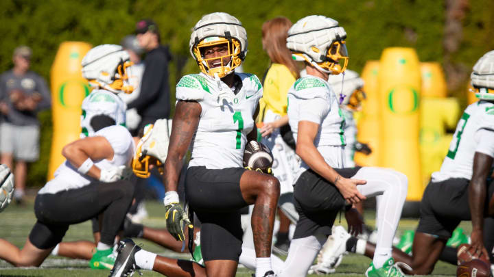 Oregon wide receiver Traeshon Holden stretches during practice with the Oregon Ducks Wednesday, Aug. 28, 2024 at the Hatfield-Dowlin Complex in Eugene, Ore.