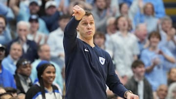 Feb 3, 2024; Chapel Hill, North Carolina, USA;  Duke basketball head coach Jon Scheyer reacts in the first half at Dean E. Smith Center. Mandatory Credit: Bob Donnan-Imagn Images