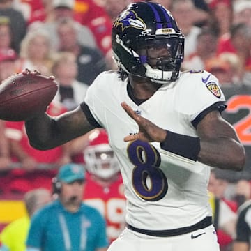 Sep 5, 2024; Kansas City, Missouri, USA; Baltimore Ravens quarterback Lamar Jackson (8) throws a pass against the Kansas City Chiefs during the first half at GEHA Field at Arrowhead Stadium.