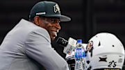 Colorado head coach Deion Sanders speaks with the media during 2025 Big 12 Football Media Days at The Star. 