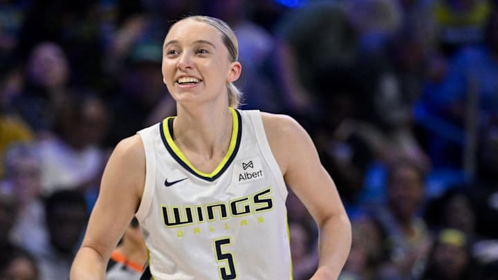Jul 28, 2025; Arlington, Texas, USA; Dallas Wings guard Paige Bueckers (5) celebrates during the game between the Dallas Wings and the New York Liberty at College Park Center. Mandatory Credit: Jerome Miron-Imagn Images