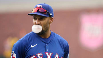 Apr 27, 2025; San Francisco, California, USA; Texas Rangers second baseman Marcus Semien (2) blows a bubble with his chewing gum during a pitching change against the San Francisco Giants during the seventh inning at Oracle Park. 
