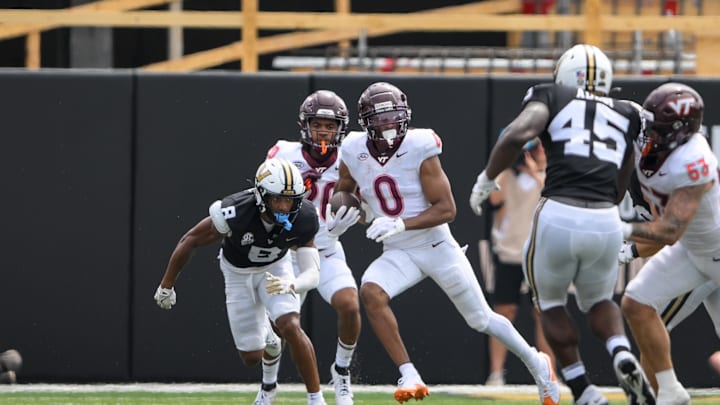 Aug 31, 2024; Nashville, Tennessee, USA; Virginia Tech Hokies wide receiver Ali Jennings (0) runs the ball against the Vanderbilt Commodores during the second half at FirstBank Stadium. Mandatory Credit: Steve Roberts-Imagn Images