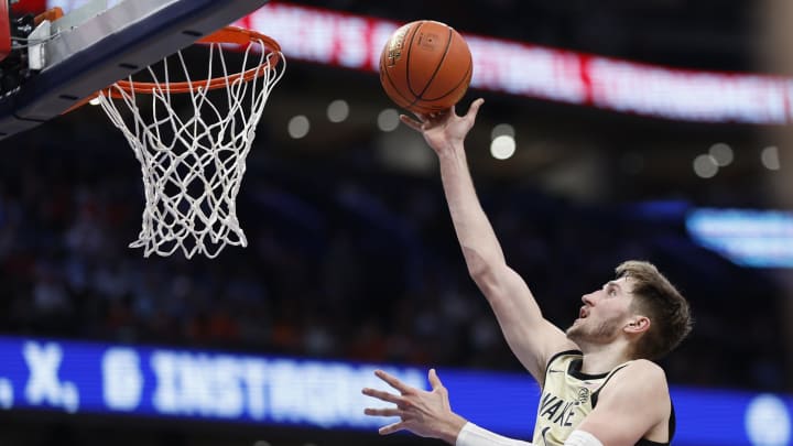 Mar 14, 2024; Washington, D.C., USA;  Wake Forest Demon Deacons forward Andrew Carr (11) shoots the ball against the Pittsburgh Panthers in the second half at Capital One Arena. Mandatory Credit: Geoff Burke-USA TODAY Sports