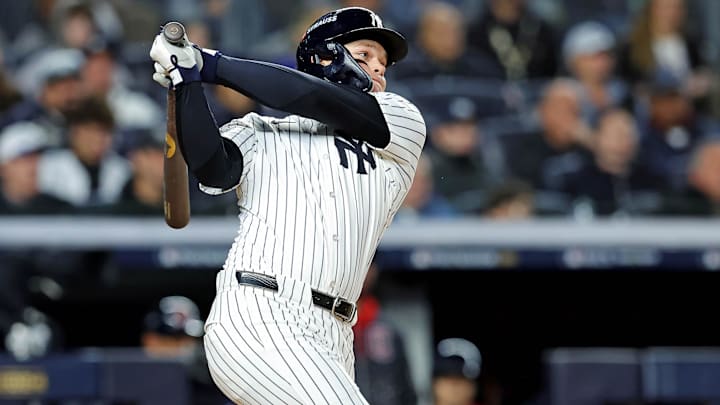Oct 14, 2024; Bronx, New York, USA; New York Yankees outfielder Alex Verdugo (24) hits a single during the second inning against the Cleveland Guardians in game one of the ALCS for the 2024 MLB Playoffs at Yankee Stadium. Mandatory Credit: Brad Penner-Imagn Images