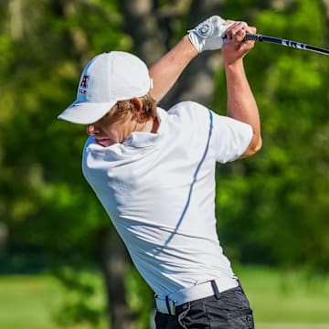 Arrowhead golfer Parker Mayhew drives during the Waukesha County Championship at Wanaki Golf Course in Menomonee Falls, Friday, May 10, 2024.