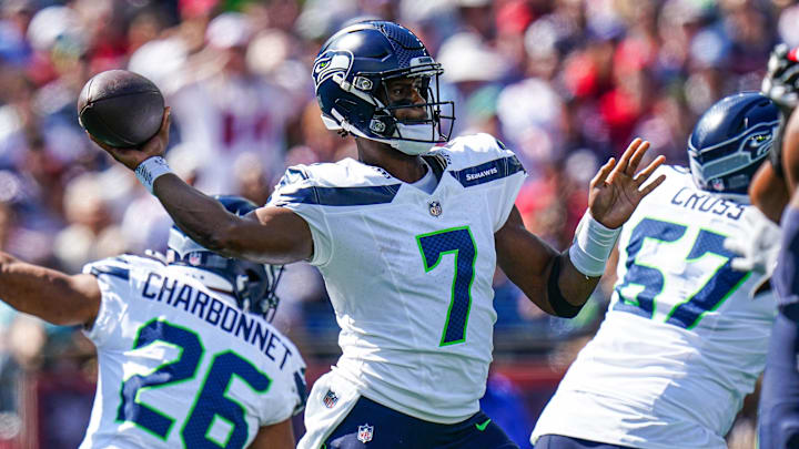 Sep 15, 2024; Foxborough, Massachusetts, USA; Seattle Seahawks quarterback Geno Smith (7) throws a pass against the New England Patriots in the first quarter at Gillette Stadium. Mandatory Credit: David Butler II-Imagn Images