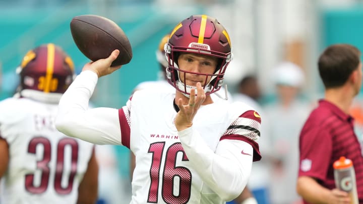 Aug 17, 2024; Miami Gardens, Florida, USA;  Washington Commanders quarterback Jeff Driskel (16) warms up before the preseason game against the Miami Dolphins at Hard Rock Stadium. Mandatory Credit: Jim Rassol-USA TODAY Sports