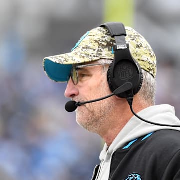 Frank Reich watches a Panthers game against the Titans from the sidelines.