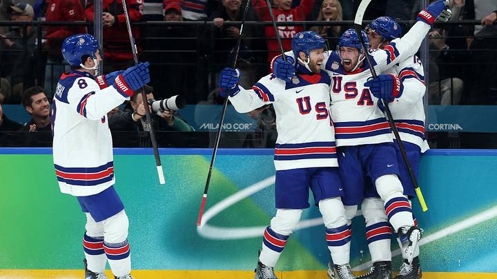 [US, Mexico & Canada customers only] Feb 20, 2026; Milan, Italy; Dylan Larkin of United States celebrates with teammates after scoring their first goal  against Slovakia in a men's ice hockey semifinal during the Milano Cortina 2026 Olympic Winter Games at Milano Santagiulia Ice Hockey Arena. Mandatory Credit: Mike Segar/Reuters via Imagn Images