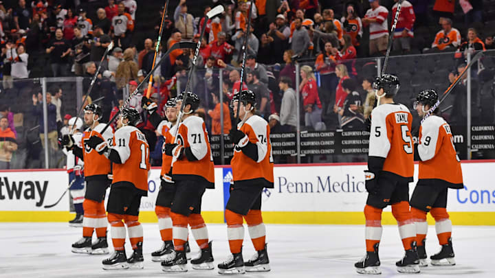 Apr 16, 2024; Philadelphia, Pennsylvania, USA; Philadelphia Flyers right wing Travis Konecny (11), right wing Tyson Foerster (71) and right wing Owen Tippett (74) acknowledge the fans after loss to the Washington Capitals during the second period at Wells Fargo Center. Mandatory Credit: Eric Hartline-USA TODAY Sports