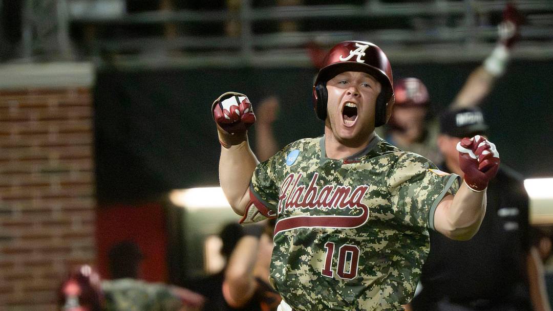 May 31, 2026; Tuscaloosa, AL, USA; Alabama batter Brady Neal (10) rejoices as he runs to first after his three-run homer cleared the wall during the Tuscaloosa NCAA Regional in the championship series between Oklahoma State and Alabama. Alabama won 9-7 in 11 innings.