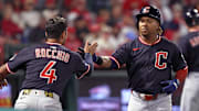 Apr 4, 2025; Anaheim, California, USA;  Cleveland Guardians third baseman Jose Ramirez (11, right) is greeted by shortstop Brayan Rocchio (4) after hitting a home run during the fifth inning against the Los Angeles Angels at Angel Stadium. Mandatory Credit: Kiyoshi Mio-Imagn Images