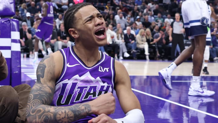 Mar 18, 2024; Salt Lake City, Utah, USA; Utah Jazz guard Keyonte George (3) reacts to a play against the Minnesota Timberwolves during the first quarter at Delta Center. 