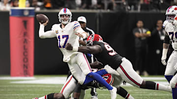 Oct 13, 2025; Atlanta, Georgia, USA; Atlanta Falcons defensive tackle David Onyemata (90) and defensive tackleSam Roberts (99) applie the pressure on Buffalo Bills quarterback Josh Allen (17) who is looking to show downfield during the second half of a game at Mercedes-Benz Stadium. Mandatory Credit: Dale Zanine-Imagn Images