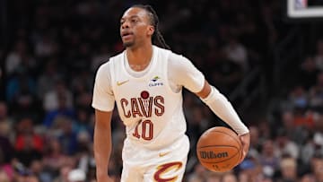 Mar 21, 2025; Phoenix, Arizona, USA; Cleveland Cavaliers guard Darius Garland (10) dribbles against the Phoenix Suns during the first half at Footprint Center. Mandatory Credit: Joe Camporeale-Imagn Images