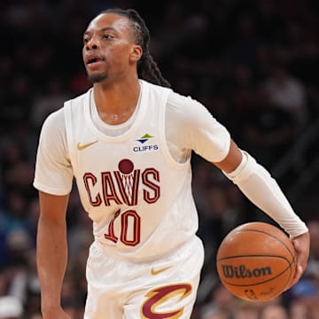 Mar 21, 2025; Phoenix, Arizona, USA; Cleveland Cavaliers guard Darius Garland (10) dribbles against the Phoenix Suns during the first half at Footprint Center. Mandatory Credit: Joe Camporeale-Imagn Images
