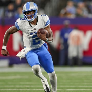 Aug 8, 2024; East Rutherford, New Jersey, USA;  Detroit Lions quarterback Hendon Hooker (2) runs the ball during the game agains the New York Giants at MetLife Stadium. Mandatory Credit: Scott Rausenberger-USA TODAY Sports