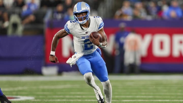 Aug 8, 2024; East Rutherford, New Jersey, USA;  Detroit Lions quarterback Hendon Hooker (2) runs the ball during the game agains the New York Giants at MetLife Stadium. Mandatory Credit: Scott Rausenberger-USA TODAY Sports