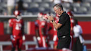 Houston Cougars head coach Willie Fritz walks on the field before the game against the Colorado Buffaloes.