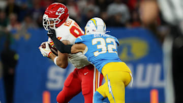 [US, Mexico & Canada customers only] Sep 5, 2025; Sao Paulo, BRAZIL; Kansas City Chiefs tight end Travis Kelce (87) runs against Los Angeles Chargers safety Alohi Gilman (32) in the first quarter during a NFL game at Corinthians Arena. Mandatory Credit: Amanda Perobelli/Reuters via Imagn Images