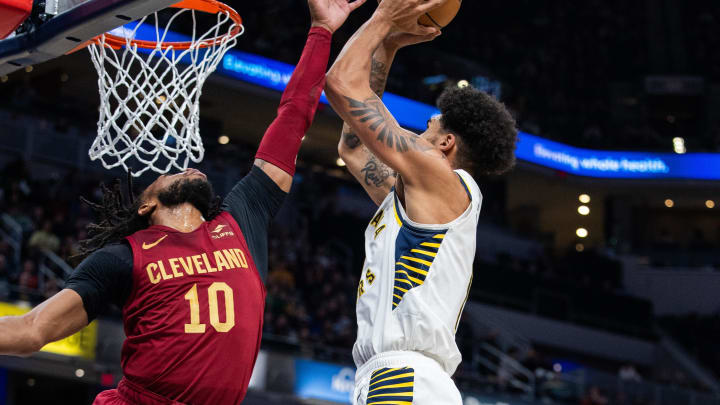 Mar 18, 2024; Indianapolis, Indiana, USA; Indiana Pacers forward Obi Toppin (1) shoots the ball while Cleveland Cavaliers guard Darius Garland (10) defends in the first half at Gainbridge Fieldhouse. Mandatory Credit: Trevor Ruszkowski-USA TODAY Sports