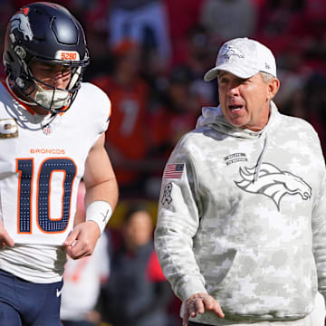 Nov 10, 2024; Kansas City, Missouri, USA; Denver Broncos quarterback Bo Nix (10) talks with head coach Sean Payton against the Kansas City Chiefs prior to a game at GEHA Field at Arrowhead Stadium. 