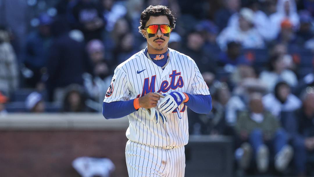 Apr 26, 2026; New York City, New York, USA;  New York Mets first baseman Mark Vientos (27) walks back to the field after striking out with the bases loaded to end the eighth inning against the Colorado Rockies at Citi Field. Mandatory Credit: Wendell Cruz-Imagn Images