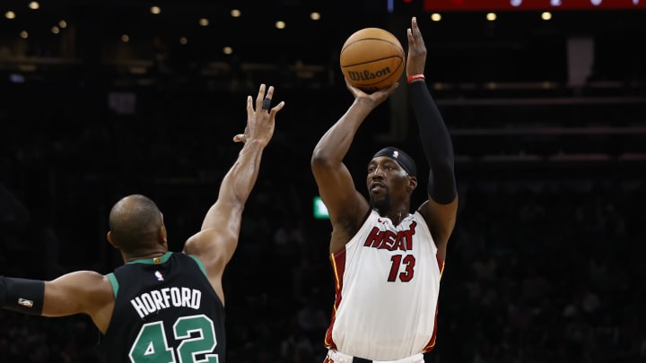 May 1, 2024; Boston, Massachusetts, USA; Miami Heat center Bam Adebayo (13) shoots against Boston Celtics center Al Horford (42) during the first quarter of game five of the first round of the 2024 NBA playoffs at TD Garden. Mandatory Credit: Winslow Townson-USA TODAY Sports