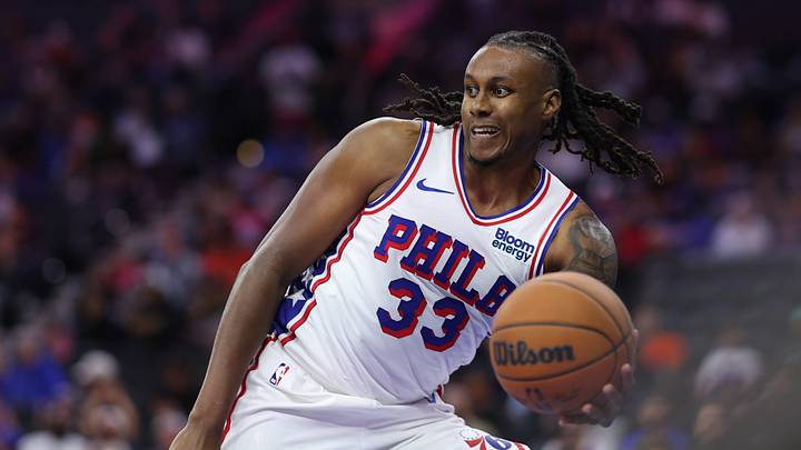 Philadelphia 76ers forward Jabari Walker (33) passes the ball against the New York Knicks during the first quarter at Xfinity Mobile Arena on Oct. 5, 2026.