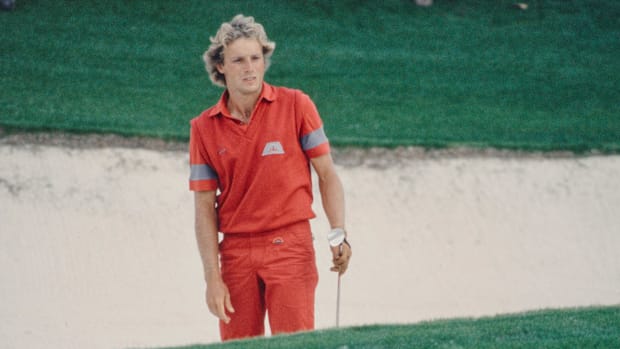 Bernhard Langer watches ball after bunker shot at the Augusta National Golf Course during the 1985 Masters.