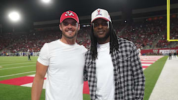 Oct 15, 2022; Fresno, California, USA; Las Vegas Raiders quarterback Derek Carr and wide receiver Davante Adams pose for a photo at halftime of the Fresno State Bulldogs vs San Jose State Spartans game at Valley Children's Stadium. Mandatory Credit: Cary Edmondson-Imagn Images