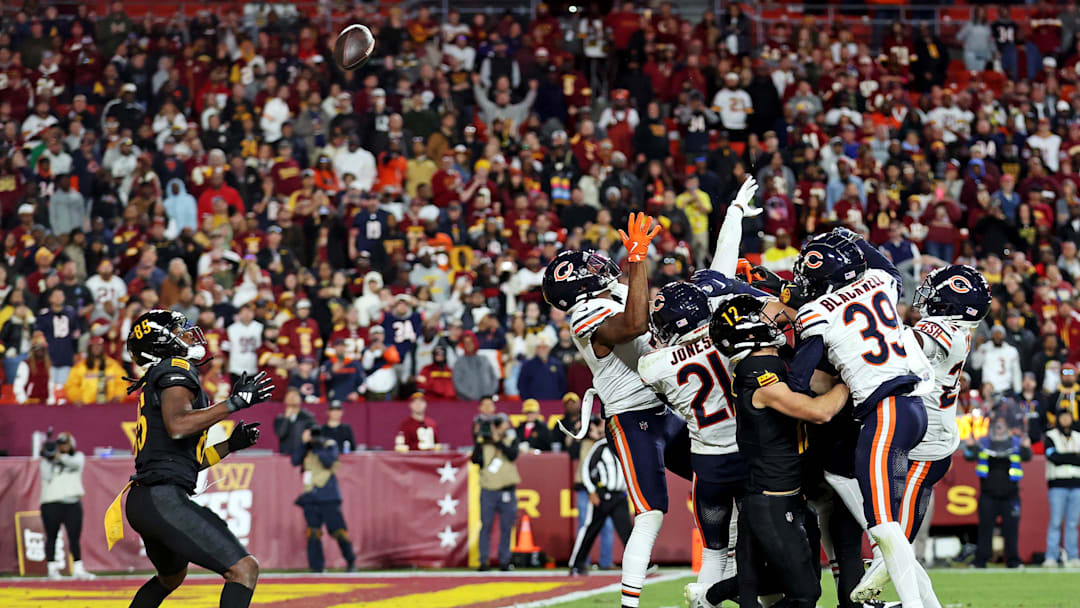 Oct 27, 2024; Landover, Maryland, USA; Washington Commanders wide receiver Noah Brown (85) catches a Hail Mary pass that was tipped with no time left to beat the Chicago Bears at Commanders Field. Mandatory Credit: Peter Casey-Imagn Images