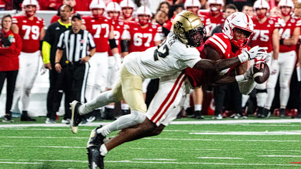 olorado Buffaloes cornerback Travis Hunter (12) blocks a pass to Nebraska Cornhuskers wide receiver Jahmal Banks 