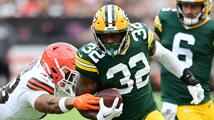Green Bay Packers running back MarShawn Lloyd (32) runs with the ball against the Cleveland Browns. Green Bay Packers running back MarShawn Lloyd (32) runs with the ball against the Cleveland Browns.