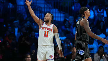 Dec 13, 2025; Las Vegas, Nevada, USA; New York Knicks guard Jalen Brunson (11) reacts as Orlando Magic forward Paolo Banchero (5) walks away during the third quarter at T-Mobile Arena. Mandatory Credit: Kirby Lee-Imagn Images